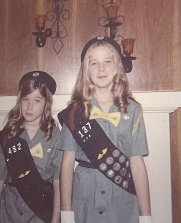 Sisters posing in their Girl Scout uniforms circa 1970