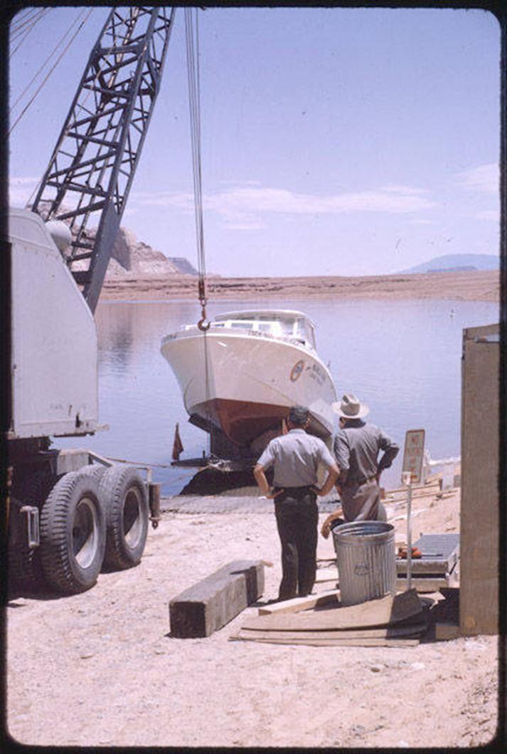 Art Greene (right) supervising the launch of a Canyon Tour boat at Lake Powell, ca. 1964