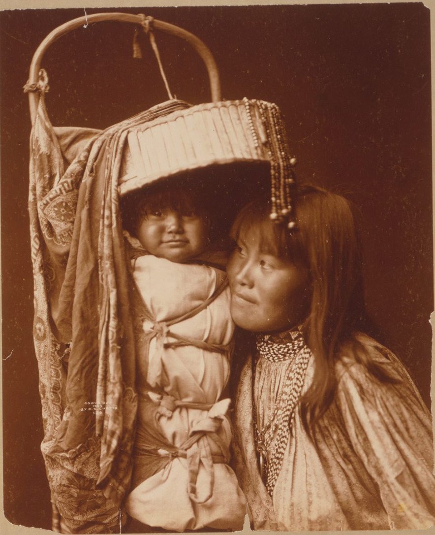 An Apache mother and her child