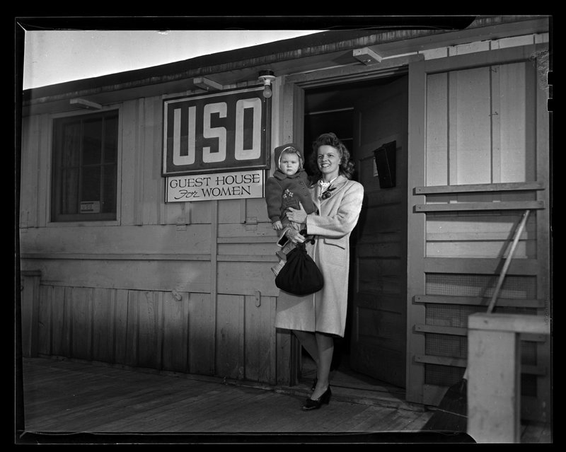 Woman and her child at the guest house