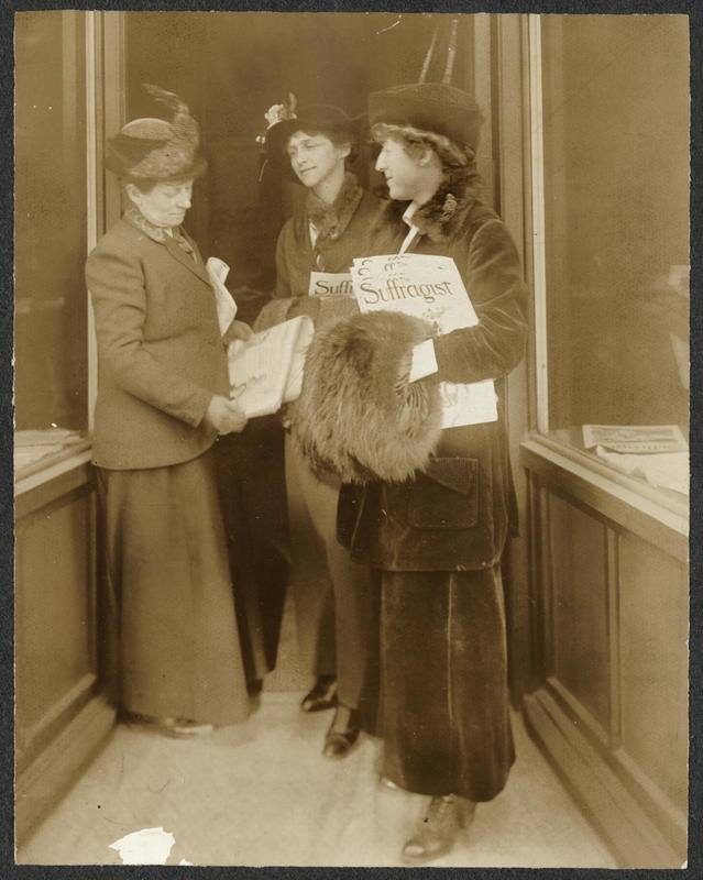 Jeannette Rankin reading a copy of The Suffragist