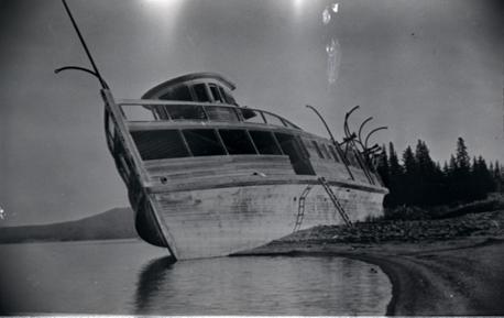 The abandoned E.C. Waters steamship lodged on the shore of Stevenson Island, where it remains today, ca. 1926