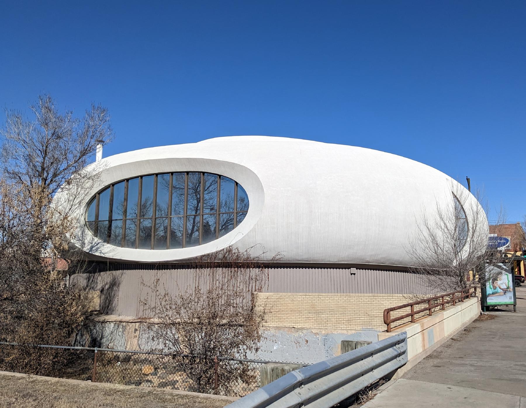 The south side of the bank and its oval porthole window.