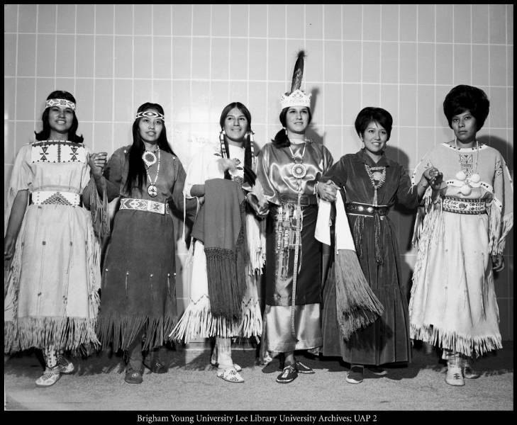 “Indian coeds dressed in the costumes of their respective tribes perform a simple dance during Indian week, 1967–1968.”