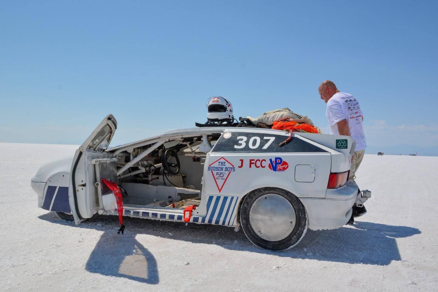 Race car sits off to the side of Speedweek 2023 track on the Bonneville Salt Flats
